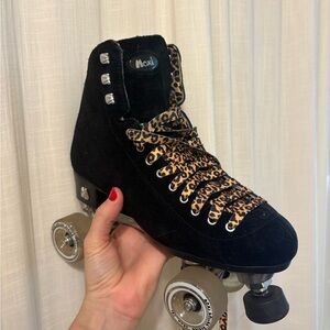 Moxi Black Panther Roller Skates with Leopard Print laces
